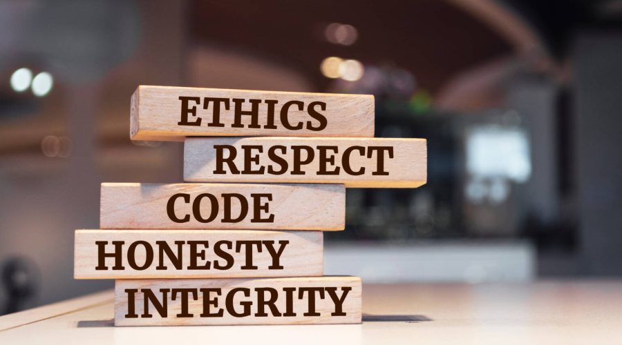 Wooden blocks with words 'ethics, respect, code, honesty, integr